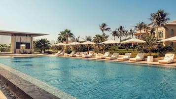 Outdoor pool, pool umbrellas, pool loungers