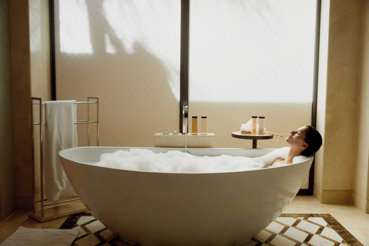 separate bathtub and shower, deep-soaking bathtub, rainfall showerhead