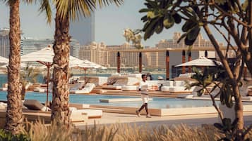 Outdoor pool, pool umbrellas, pool loungers
