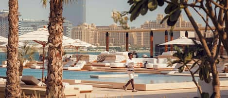 Outdoor pool, pool umbrellas, pool loungers