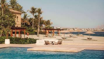 Outdoor pool, pool umbrellas, pool loungers