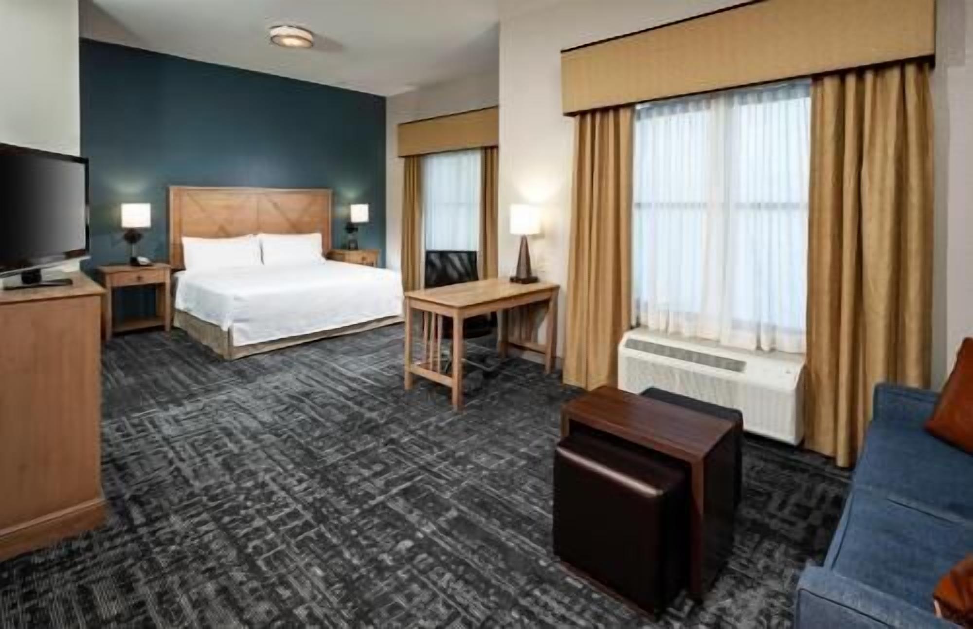 Pillow-top beds, desk, laptop workspace, blackout curtains