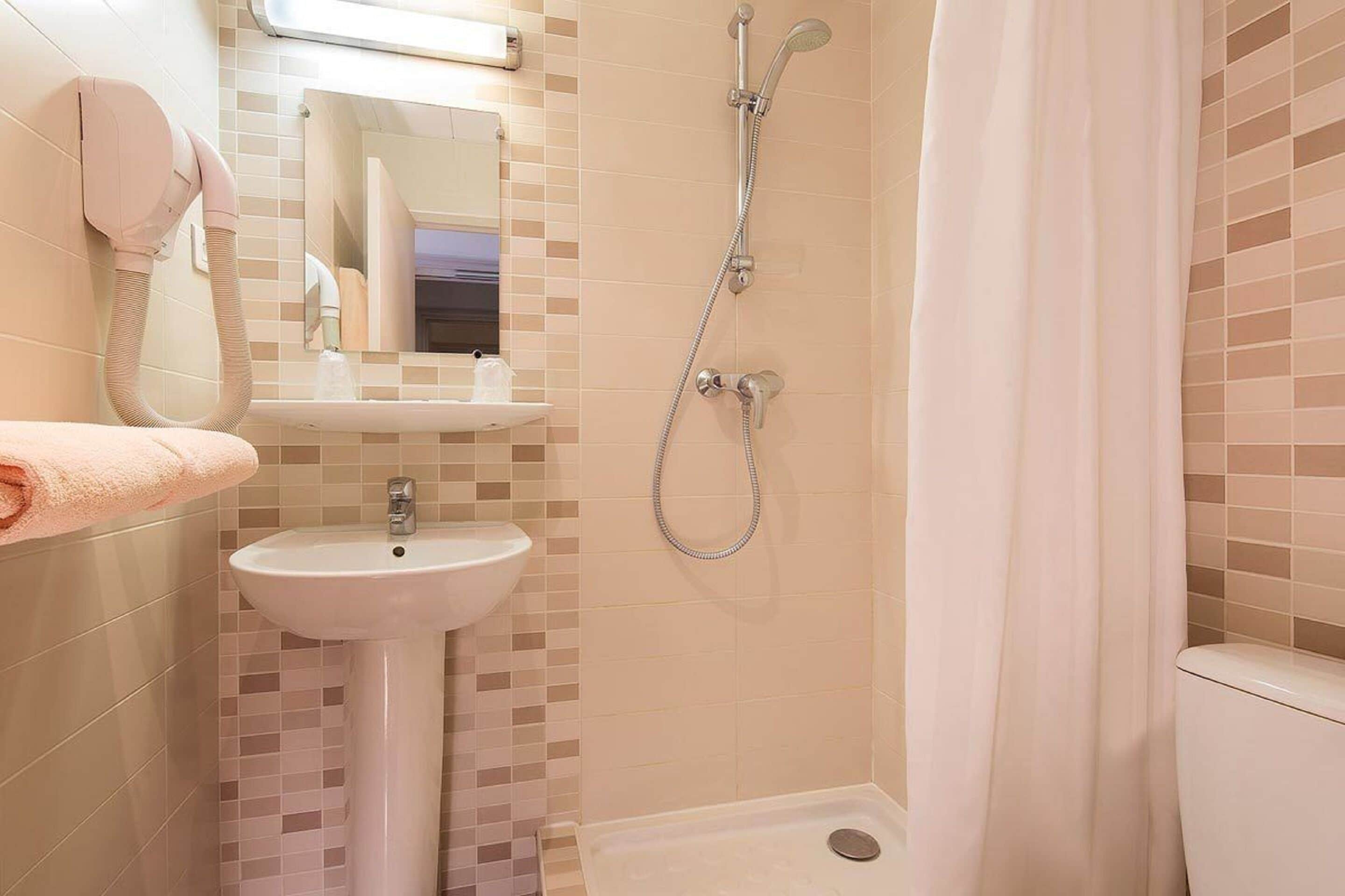single room | bathroom | hair dryer, towels