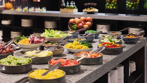 A buffet with various food items including fruits, vegetables, and salads. - Four Points by Sheraton Wroclaw (Wroclaw)