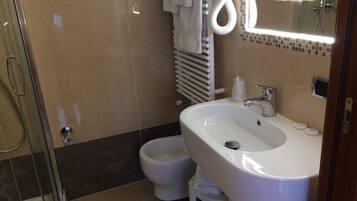 Shower, free toiletries, hair dryer, bidet
