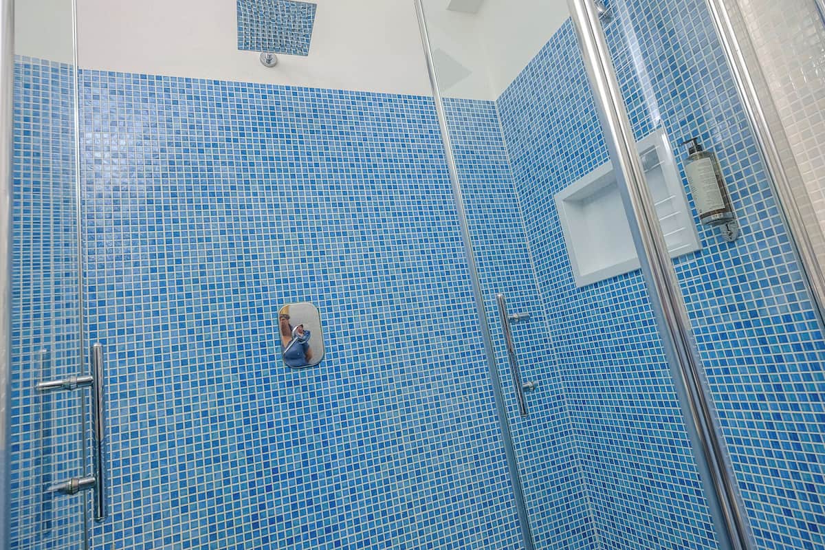 standard triple room | bathroom | shower, rainfall showerhead, designer toiletries, hair dryer