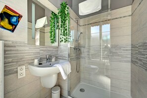 Premium Triple Room, Terrace | Bathroom | Shower, free toiletries, hair dryer, towels