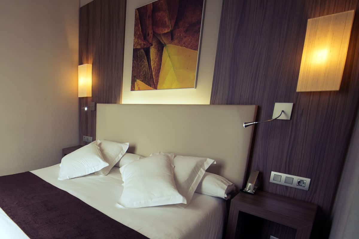 Standard Double Room | Minibar, in-room safe, desk, blackout drapes