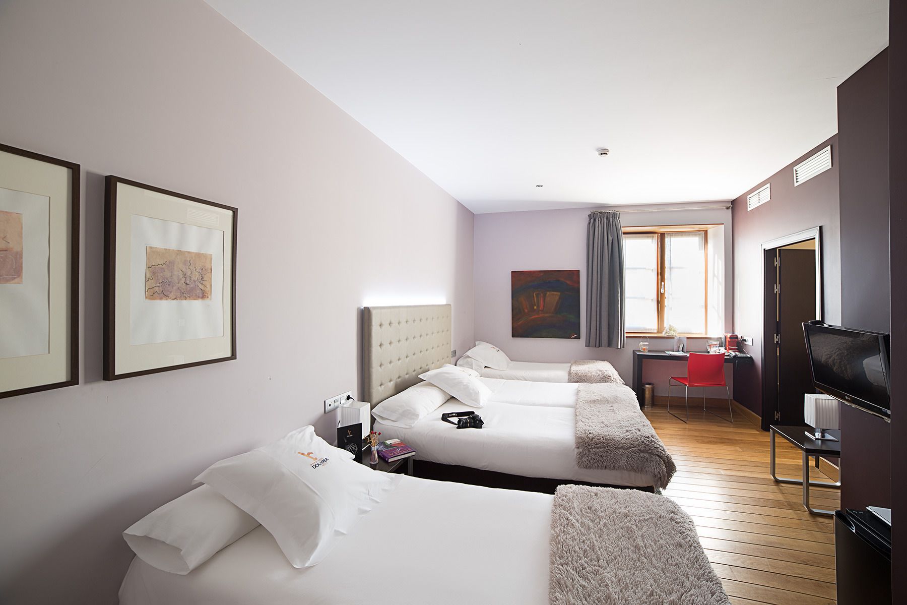 Standard Quadruple Room | Minibar, in-room safe, desk, blackout curtains