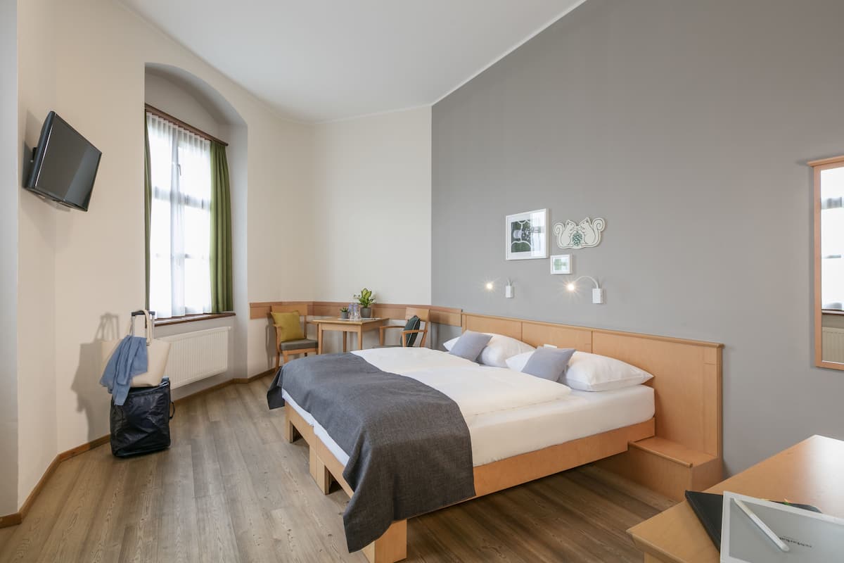 Een kluis op de kamer, gratis wifi, beddengoed