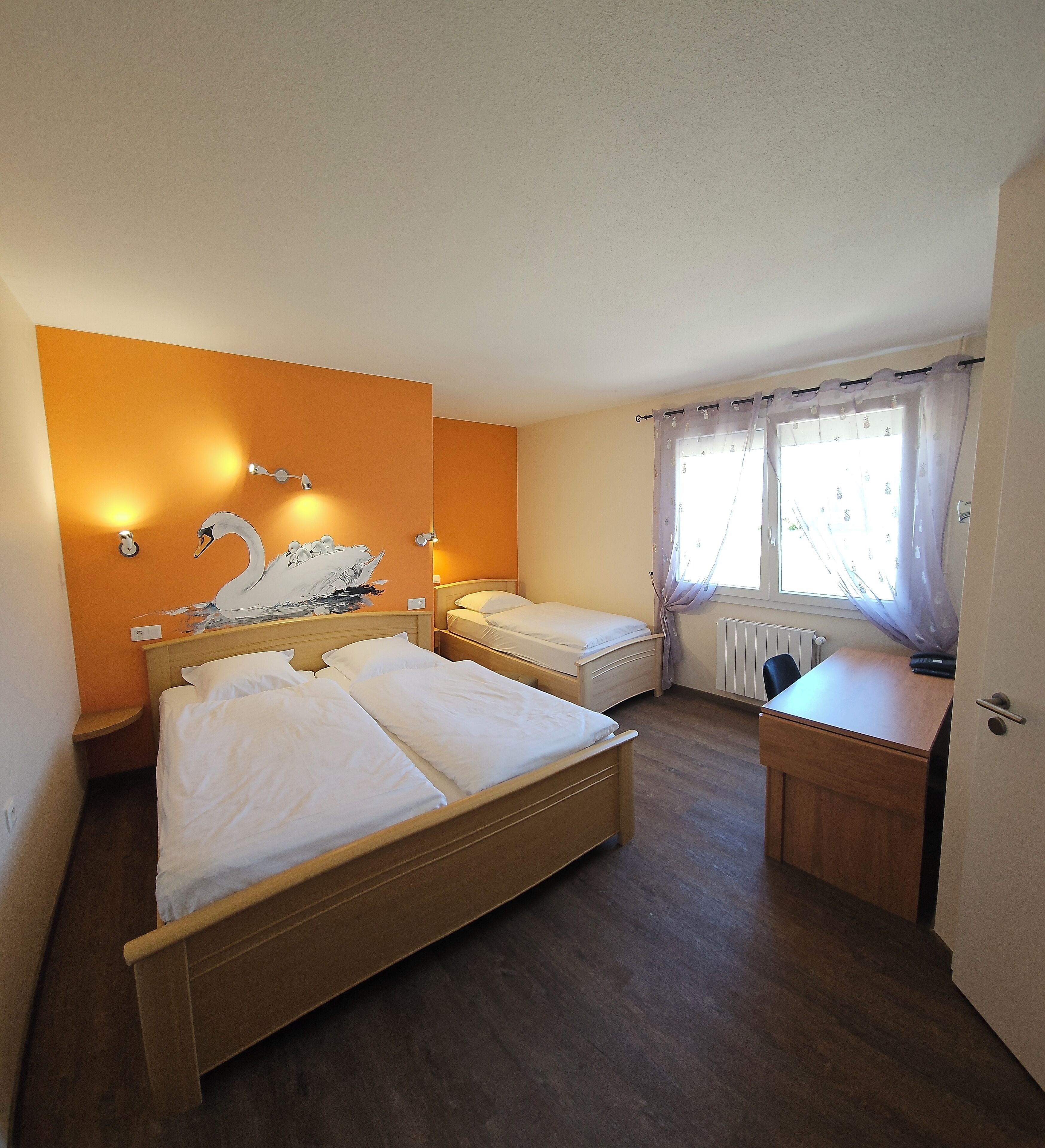 comfort triple room | in-room safe, individually decorated, desk, soundproofing