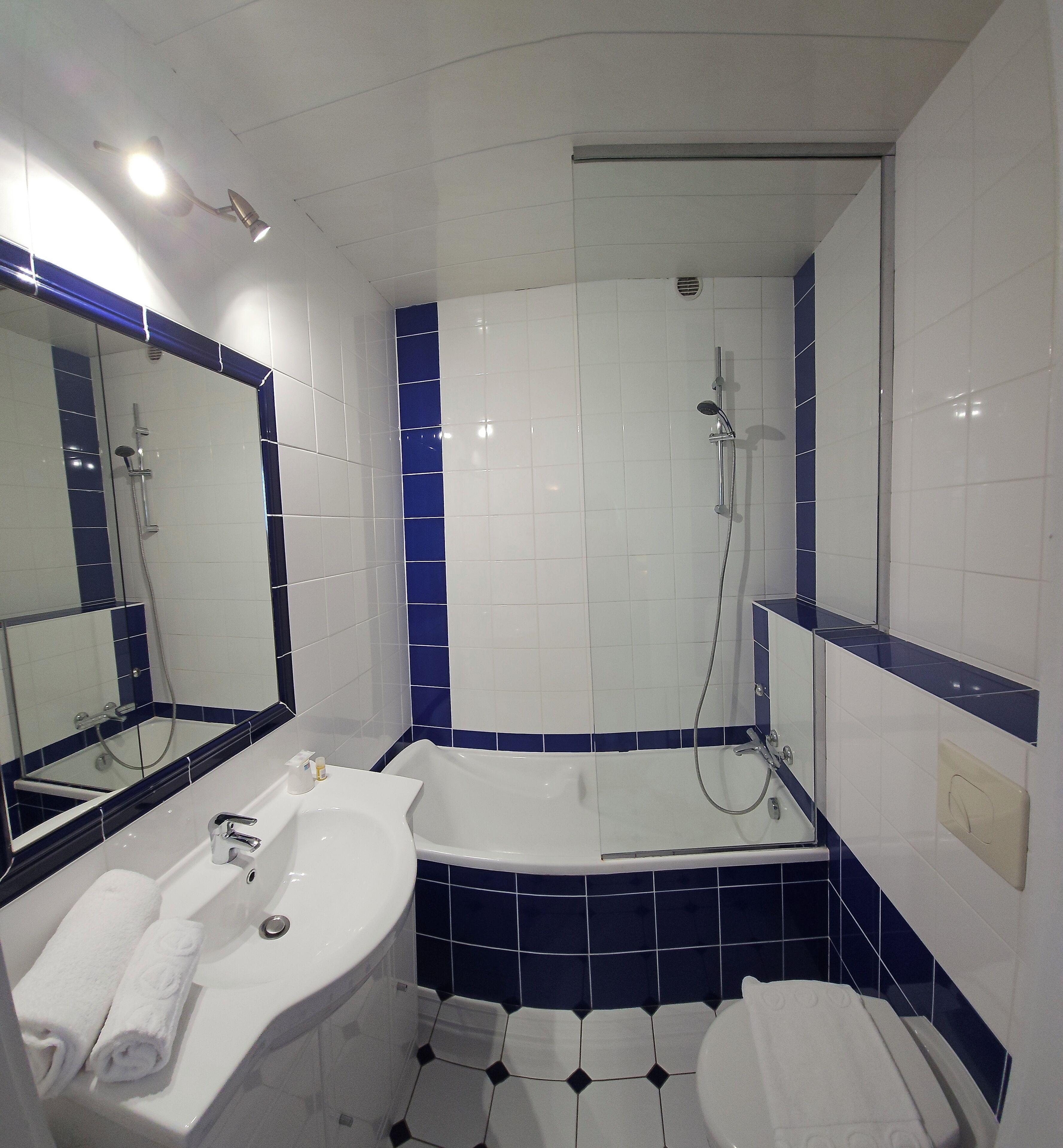 standard twin room | bathroom | hair dryer, towels