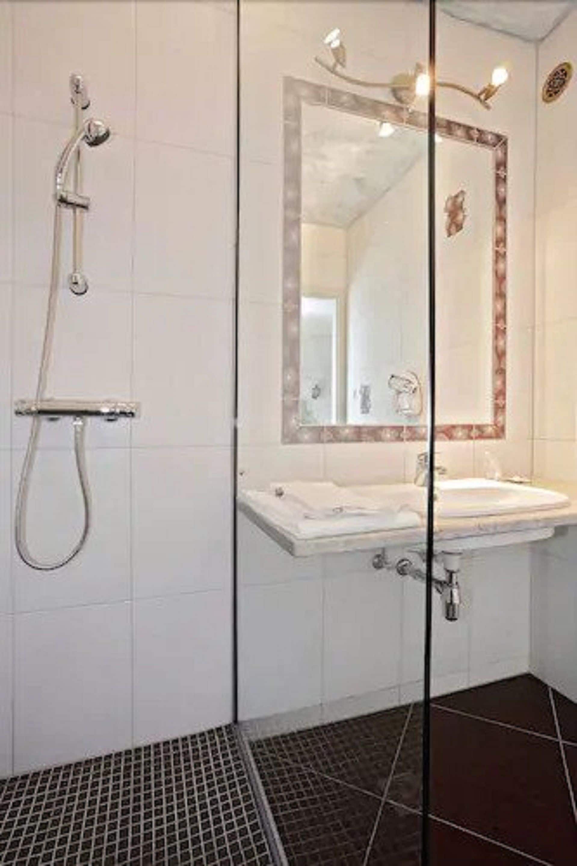 standard triple room | bathroom | hair dryer, towels