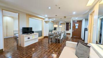 Two - Bedroom Suite | Living area | 32-inch LED TV with cable channels, TV