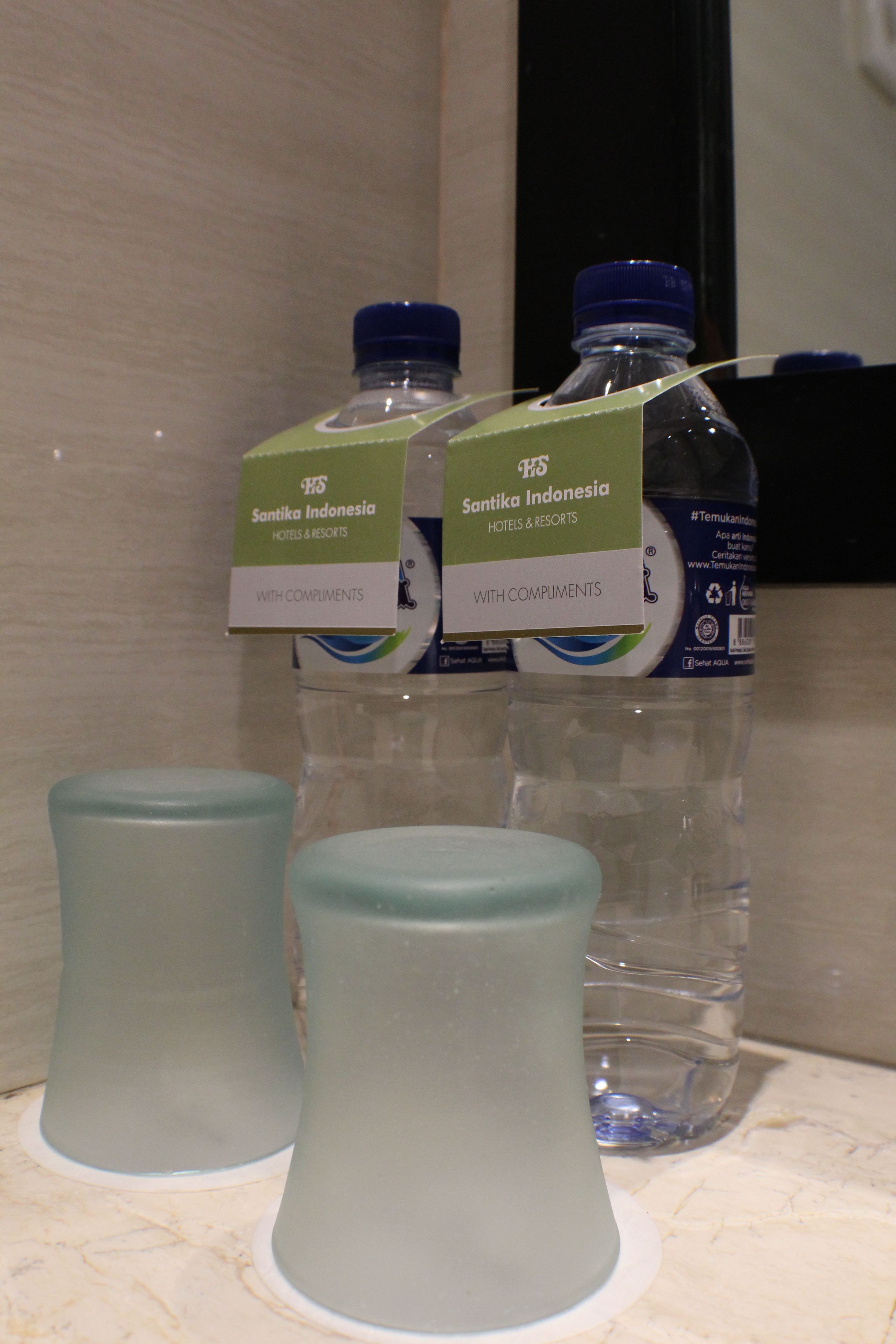 shower, hair dryer, slippers, towels