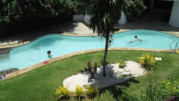 Outdoor pool, pool umbrellas, sun loungers