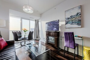 Executive 1 Bedroom Suite, Kitchen, City View | Premium bedding, pillowtop beds, individually decorated