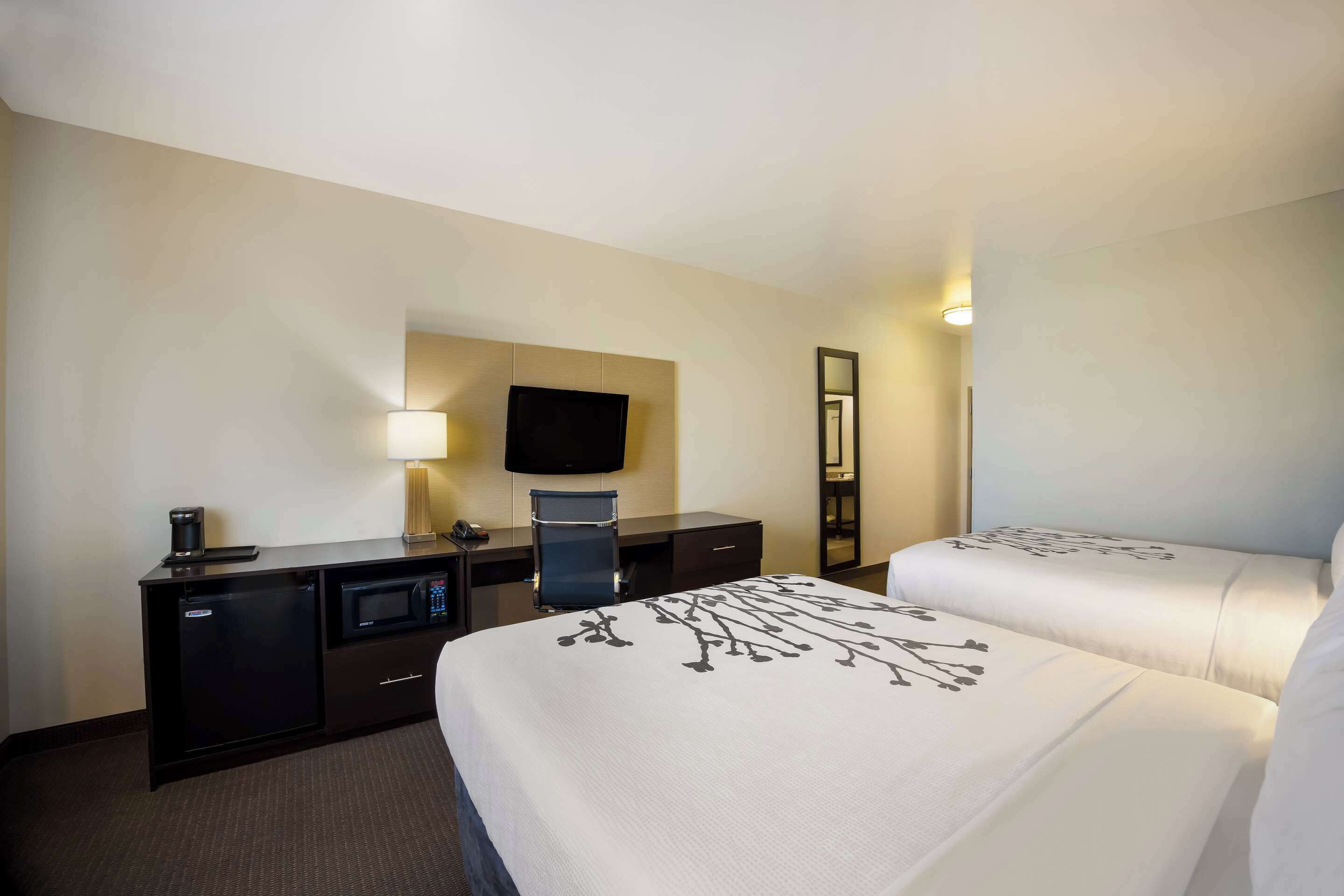 standard room, 2 queen beds, non smoking | premium bedding, in-room safe, desk, iron/ironing board