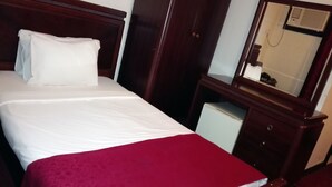 Chambre simple | Literie de qualité, minibar, coffre-fort, rideaux d’obscurcissement