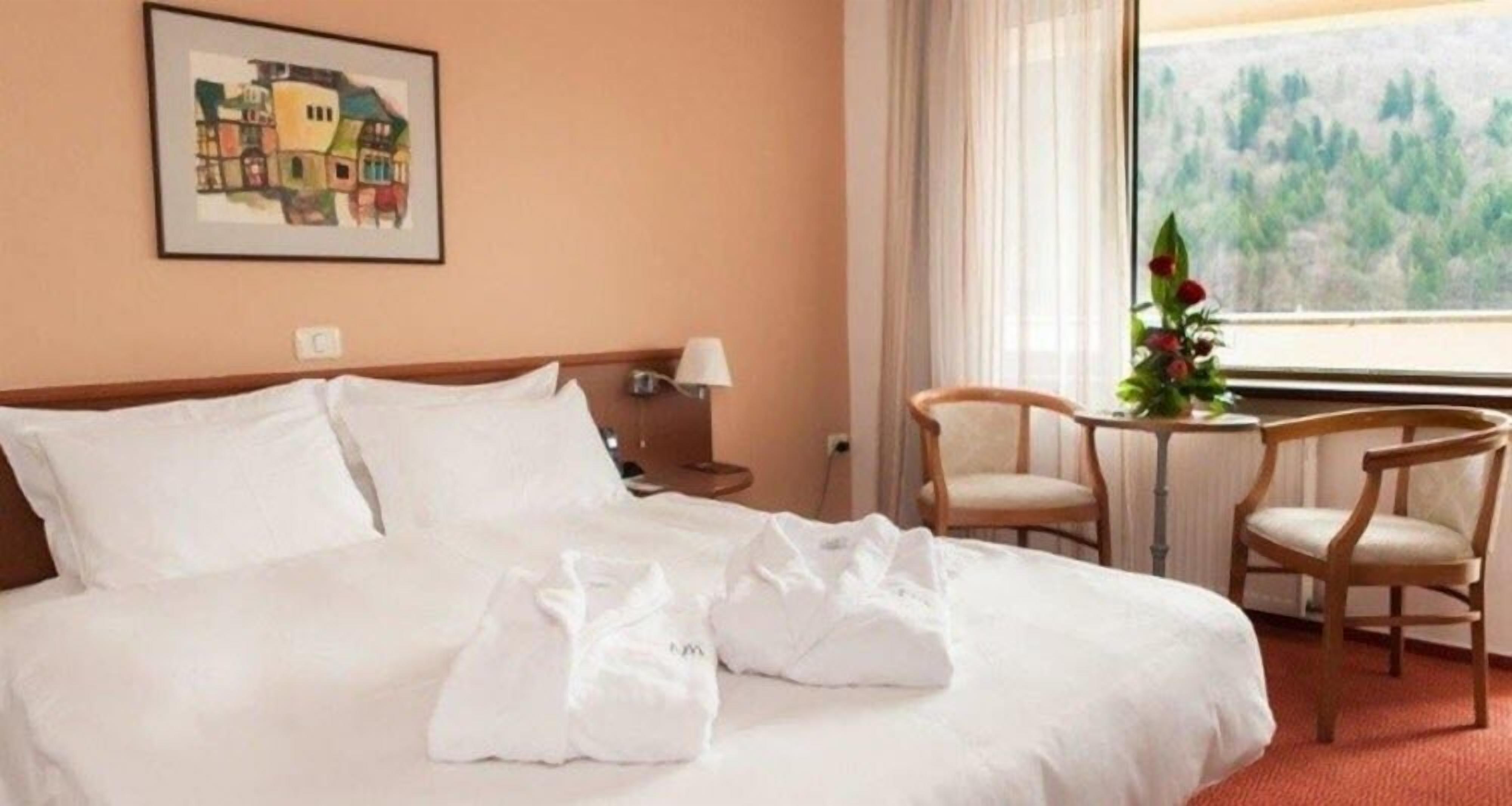 standard double room, balcony, city view | pillow-top beds, minibar, in-room safe, desk