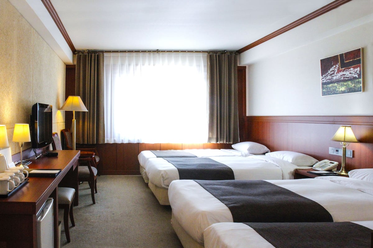 Premium bedding, free minibar items, in-room safe, desk