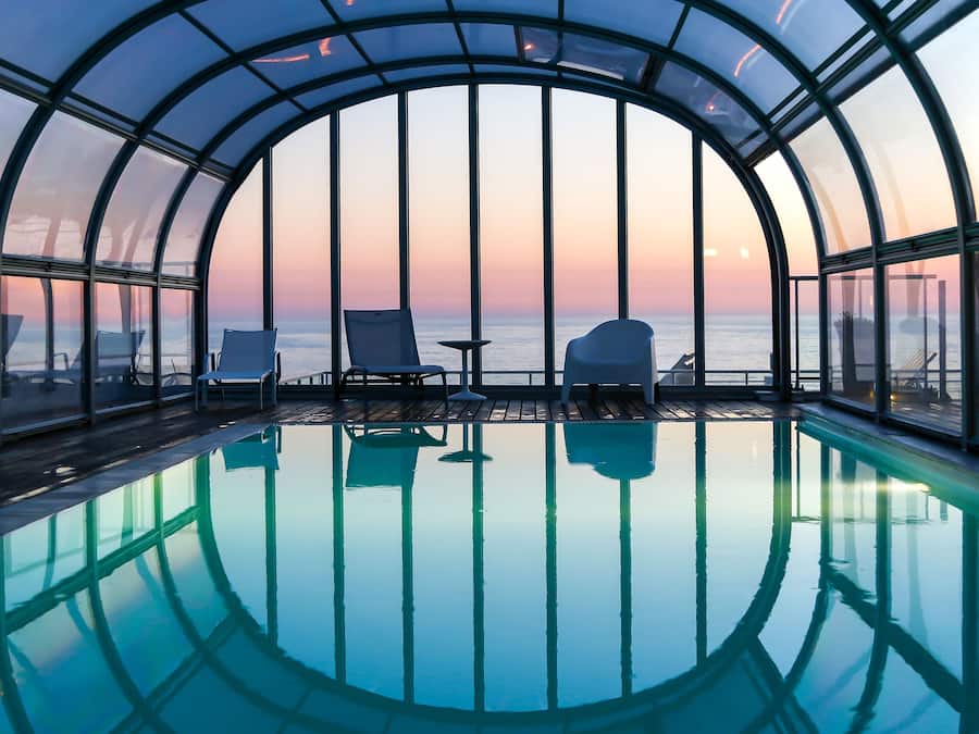 Indoor pool, open 10:00 AM to 8:00 PM, pool loungers