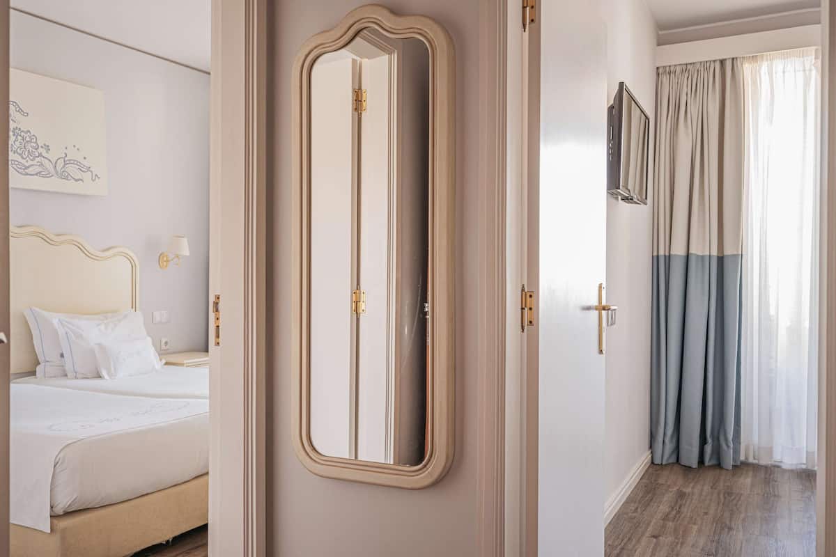 Junior Suite, Balcony | 1 bedroom, desk, laptop workspace, blackout drapes