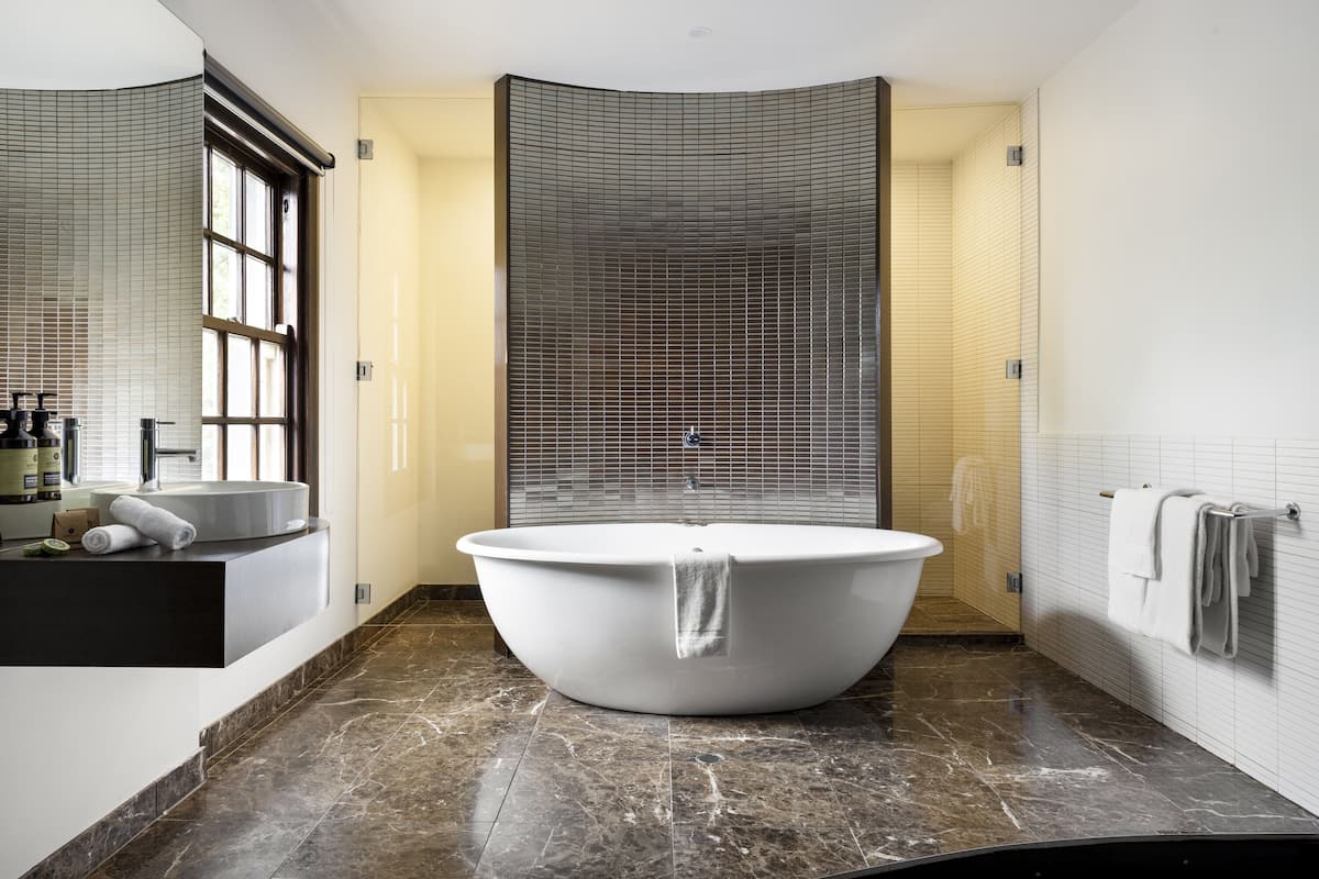 bathroom | shower, designer toiletries, hair dryer, bathrobes