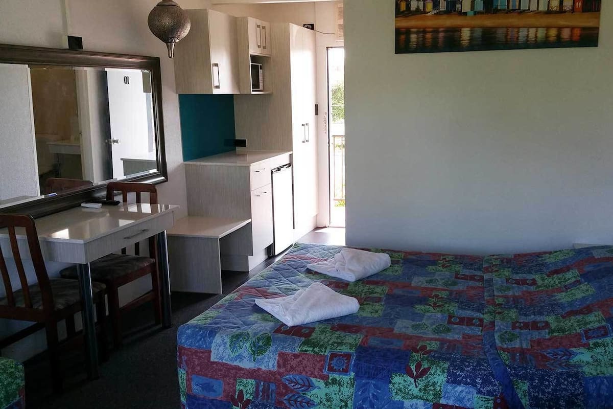 Desk, blackout drapes, iron/ironing board, free WiFi