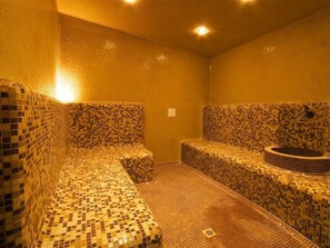 A spa room with mosaic tiled walls and benches. - Sunset Kosharitsa (KOSHARITSA)