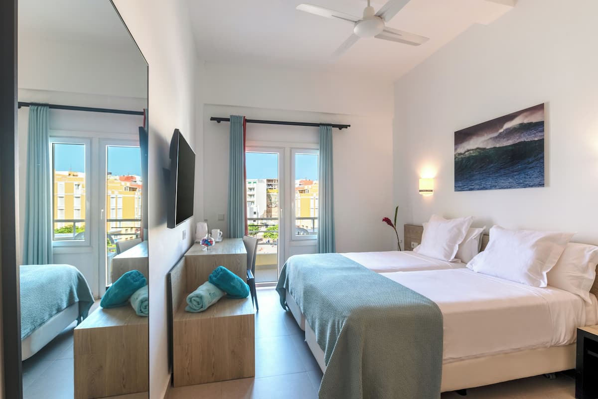 In-room safe, desk, blackout curtains, iron/ironing board