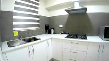 2 Bedroom Unit (Interconnecting) | Private kitchen | Full-size fridge, microwave, stovetop, coffee/tea maker