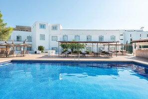 Seasonal outdoor pool, open 9:00 AM to 8:00 PM, pool umbrellas