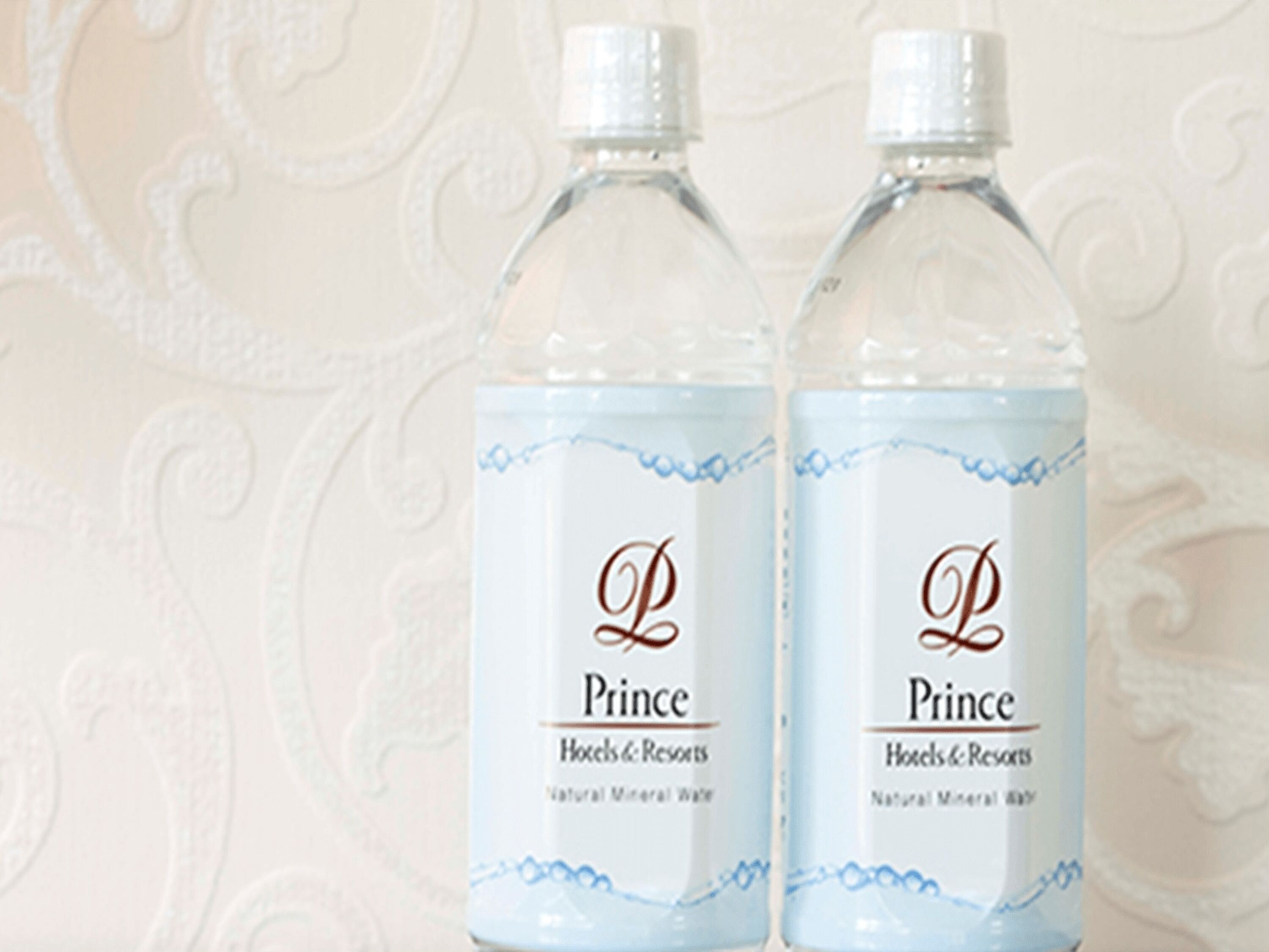 Two bottles of 'Prince Hotels & Resorts' mineral water.