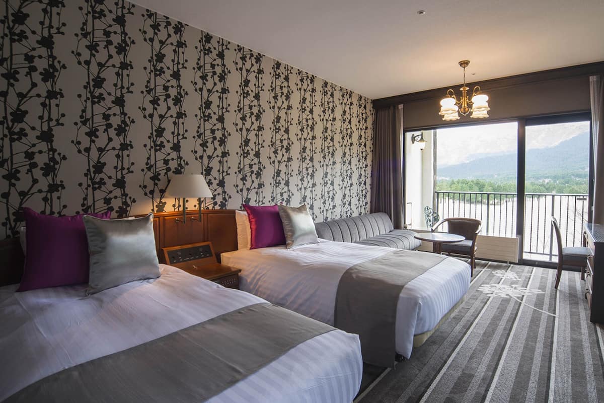 individually decorated, desk, laptop workspace, blackout curtains