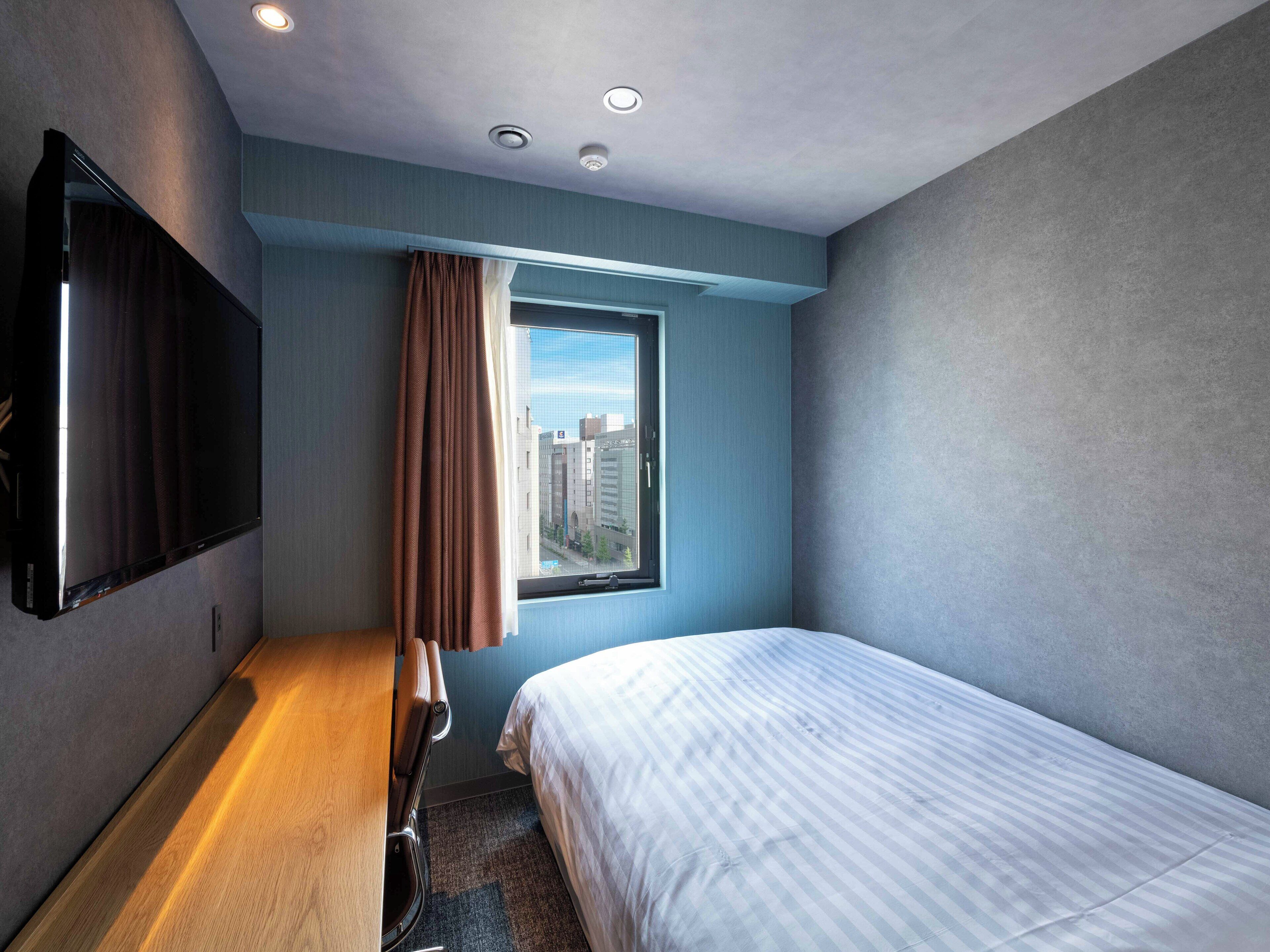 Deluxe-Zimmer, Nichtraucher (Single) | Schreibtisch, laptopgeeigneter Arbeitsplatz, Verdunkelungsvorhänge