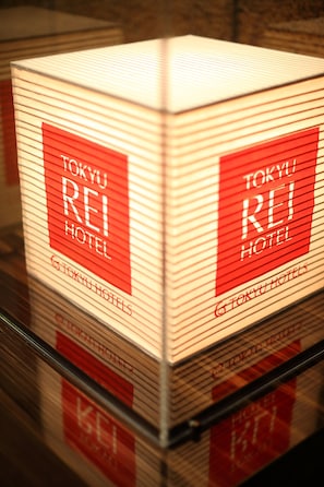 A stack of Tokyo Rei Hotel branded boxes. - Takamatsu Tokyu REI Hotel (Takamatsu)