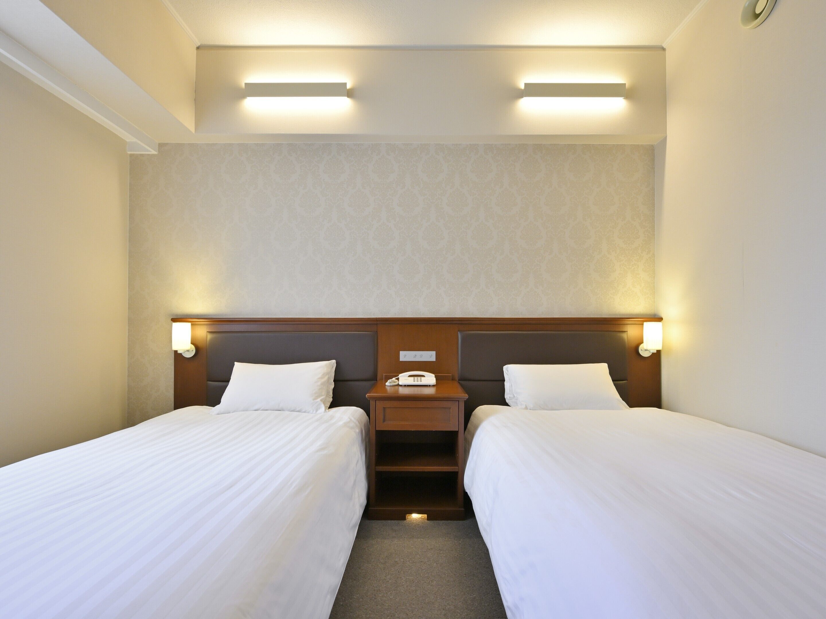Premium bedding, down duvets, in-room safe, desk