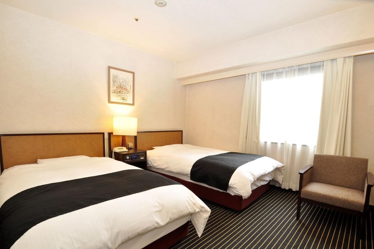 Down duvets, memory-foam beds, desk, blackout curtains