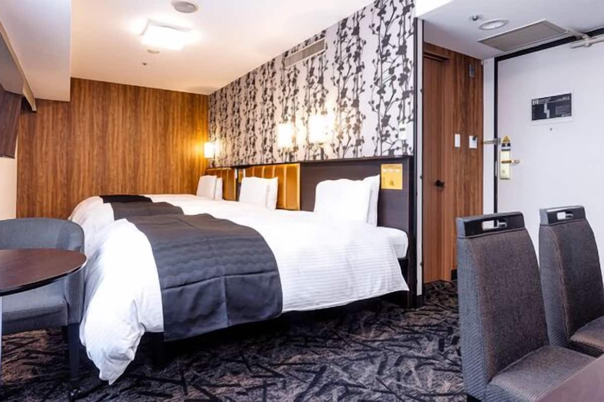 Down duvets, memory-foam beds, desk, blackout curtains