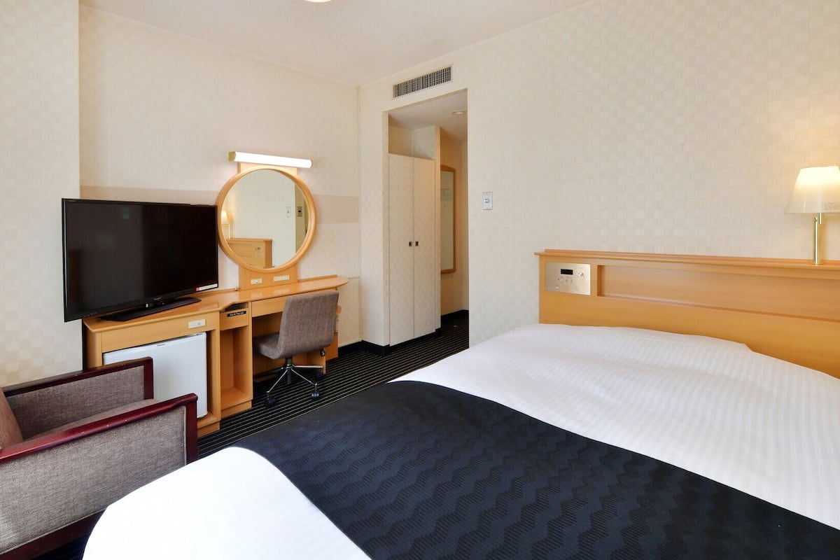 Down duvets, memory-foam beds, desk, blackout curtains