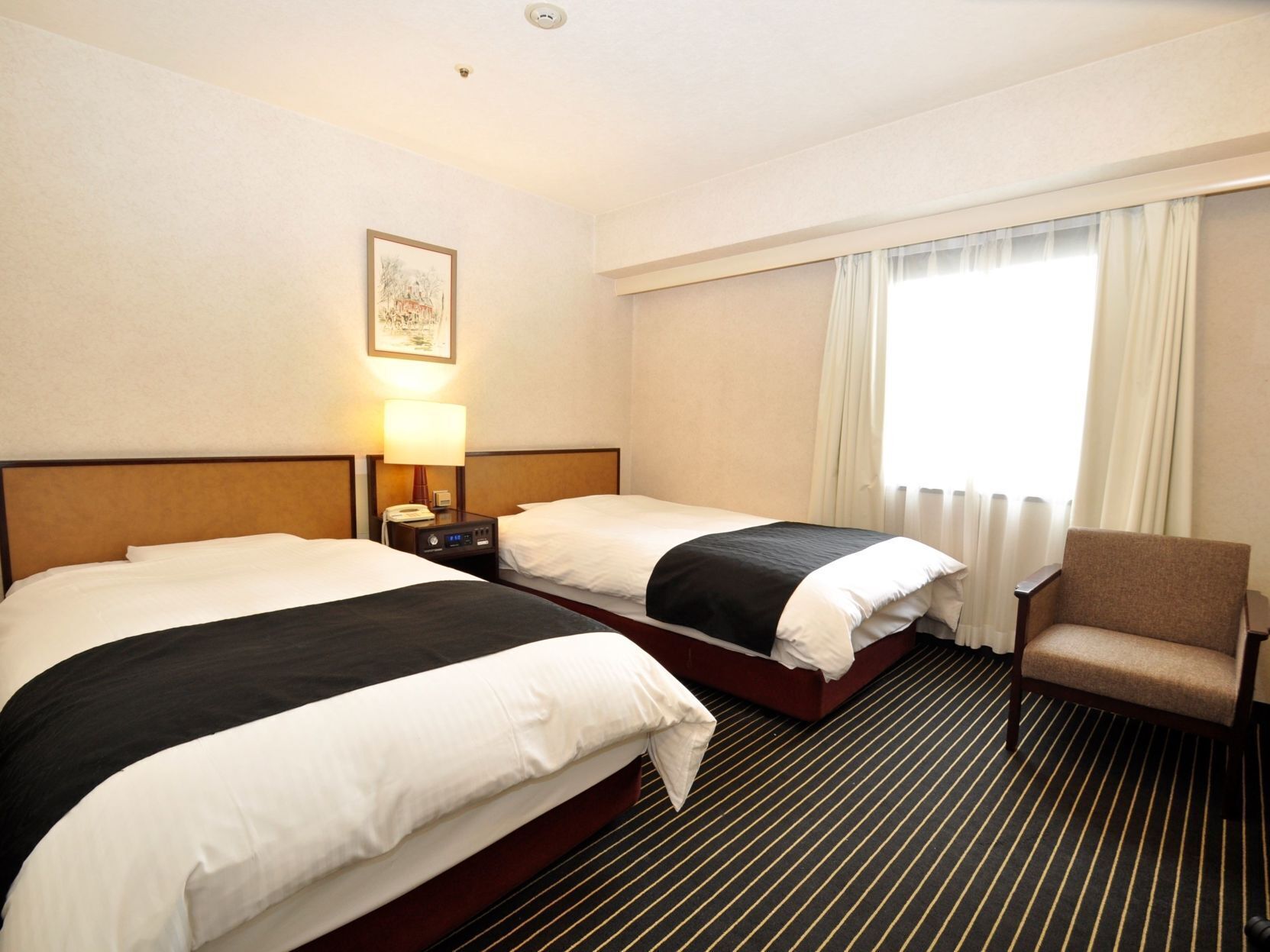 Down comforters, memory foam beds, desk, blackout drapes