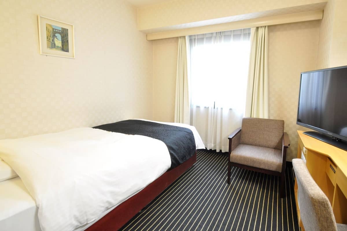 Down duvets, memory-foam beds, desk, blackout curtains