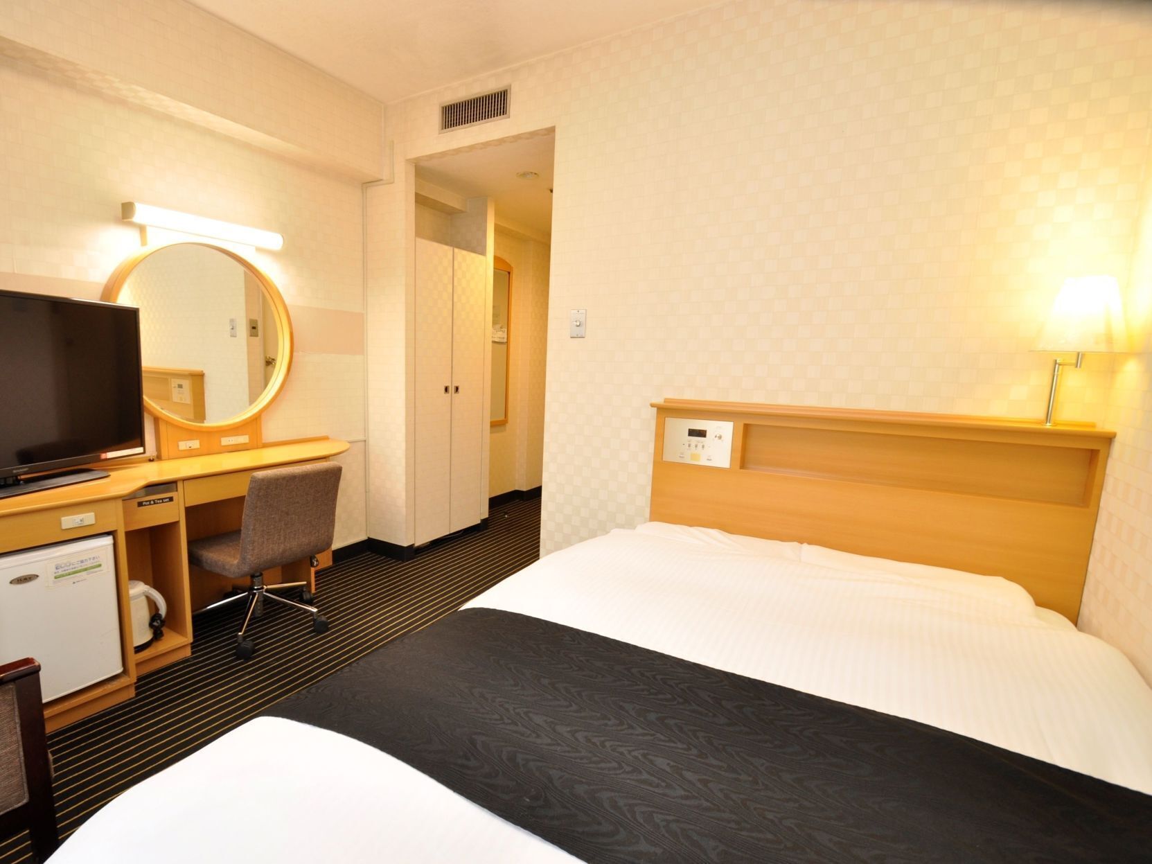 Down comforters, memory foam beds, desk, blackout drapes