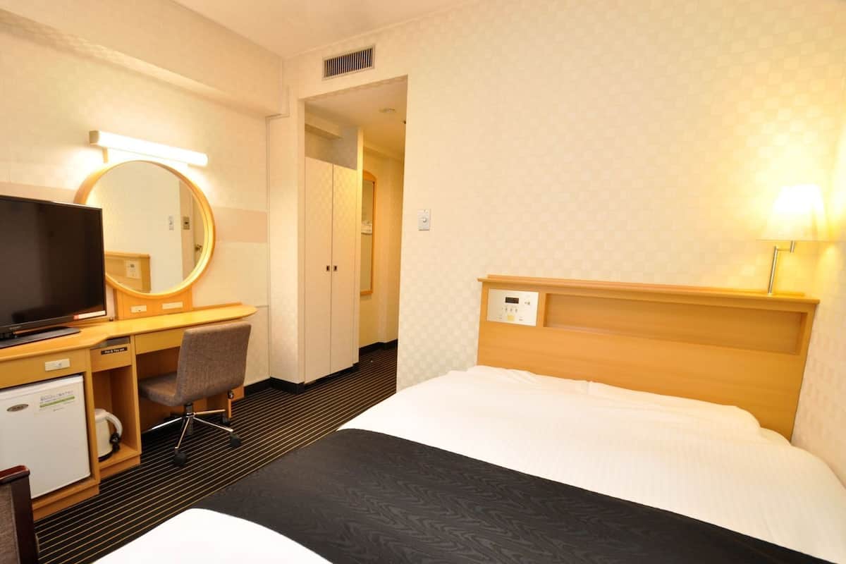 Down duvets, memory-foam beds, desk, blackout curtains