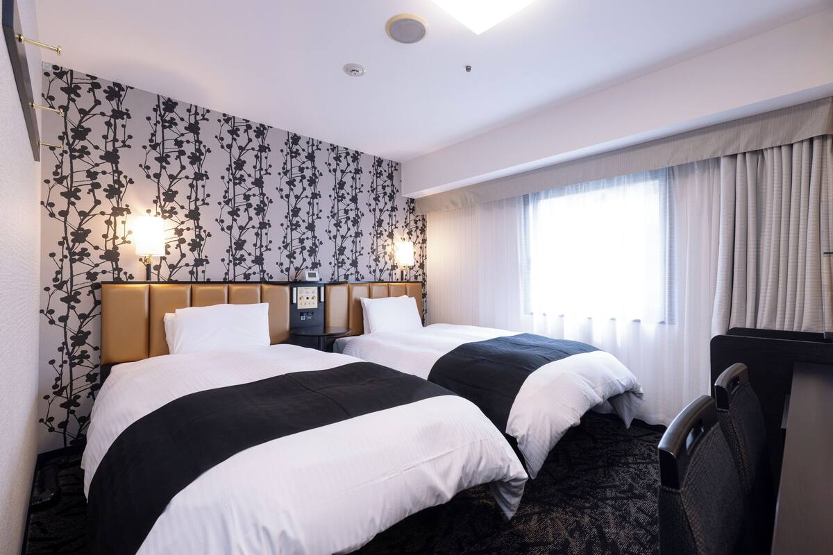 Down duvets, memory-foam beds, desk, blackout curtains