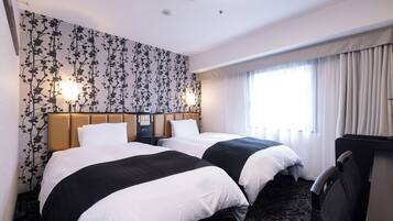 Down duvets, memory-foam beds, desk, blackout curtains