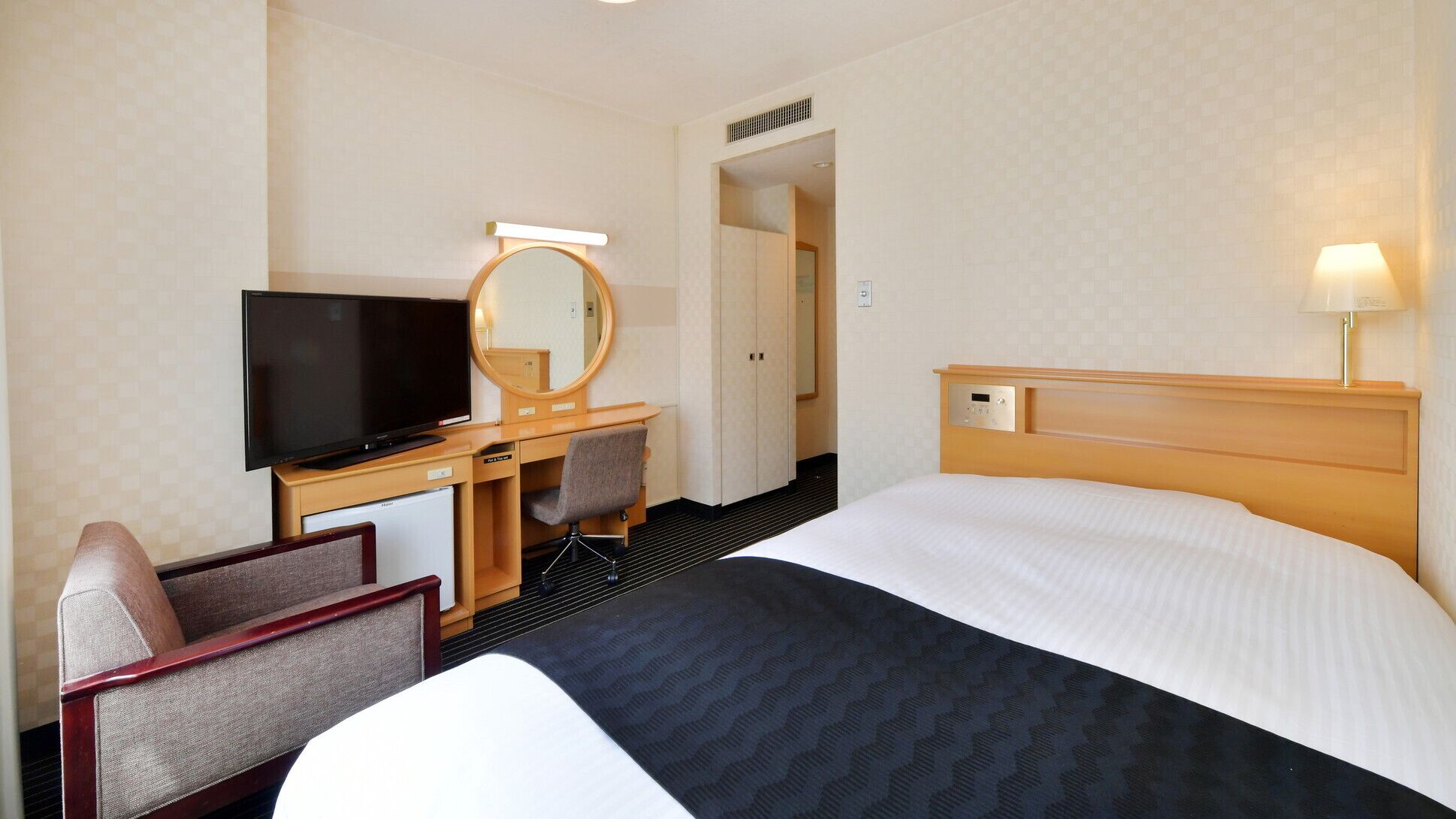 Down comforters, memory foam beds, desk, blackout drapes