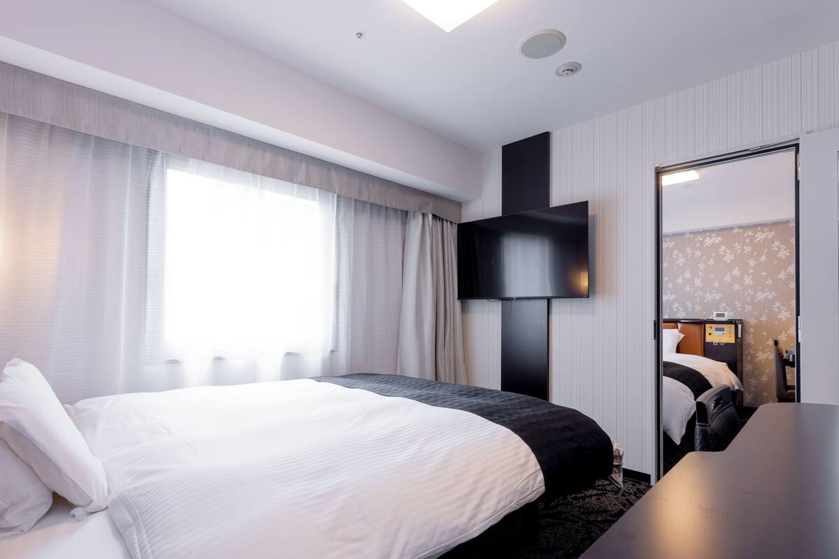 Down duvets, memory-foam beds, desk, blackout curtains