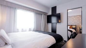 Down comforters, memory foam beds, desk, blackout drapes